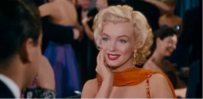 marilyn-monroe-gentlemen-prefer-blondes-orange-dress-3.webp